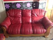 red leather SOFA AND TWO CHAIRS