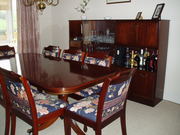 Dining table and 8 chairs with cabinet